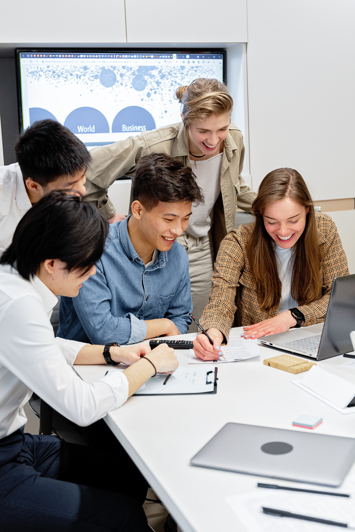 Happy Employees Having their Meeting Inside the Conference Room