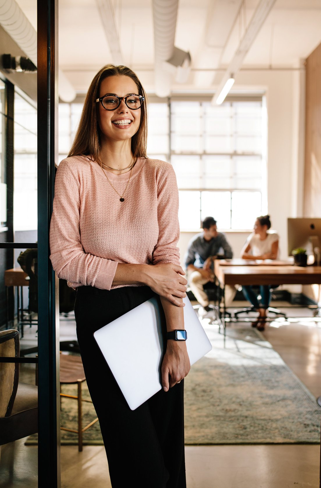 Happy Female Startup Employees at Office Doorway